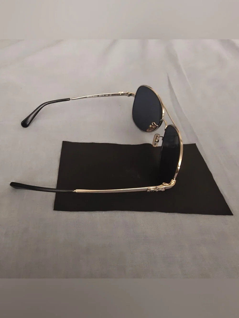 Coach Sunglasses with Silver Frame and Blue Lenses